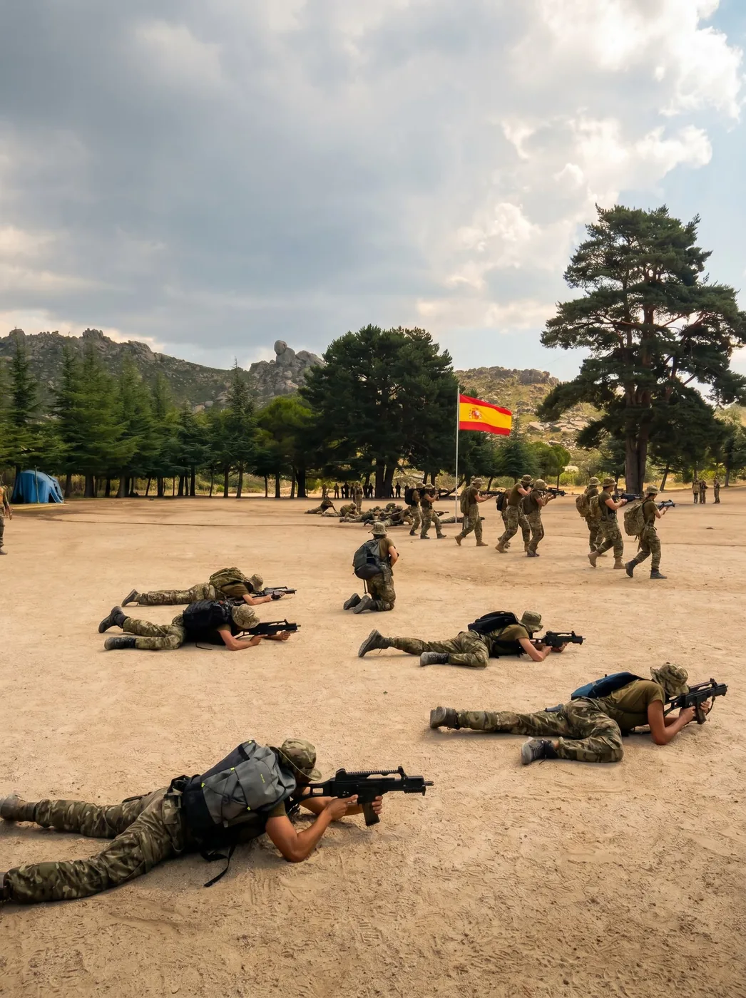 Instrucción táctica en el campo bajo la bandera de España